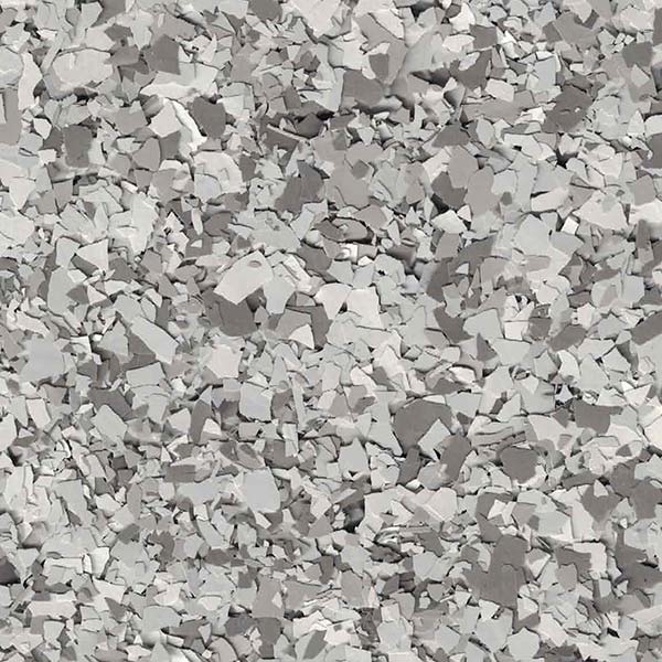 The image shows a close-up view of numerous small, irregularly shaped gray and white fragments, resembling crushed stones or gravel.