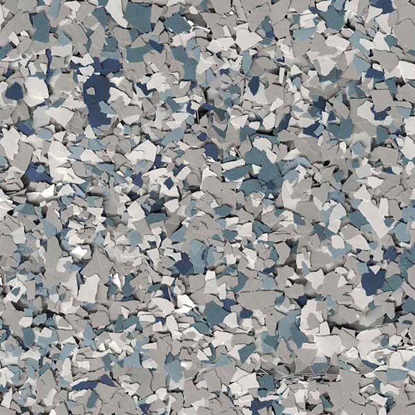 The image shows a textured surface composed of small, irregularly shaped pieces in shades of gray, blue, and white, resembling decorative flooring.