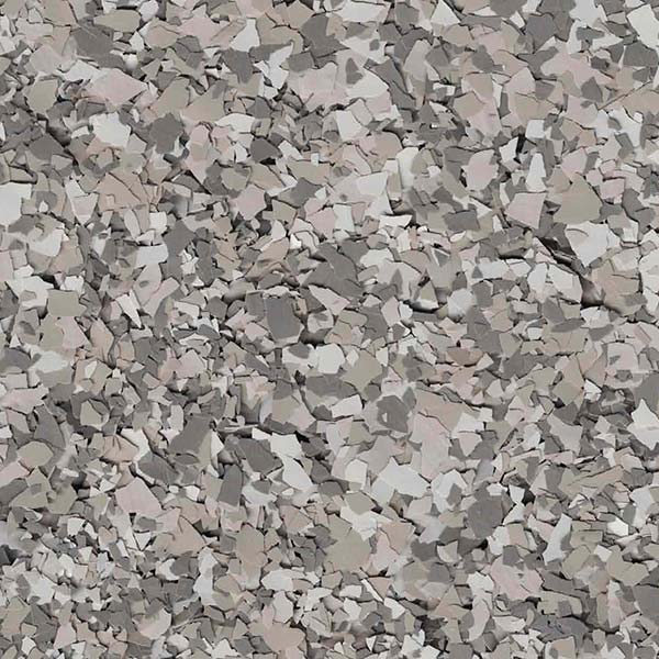 Abstract pattern of scattered, irregular shapes in various shades of grey and taupe. Resembles a textured, fragmented surface or artistic collage.