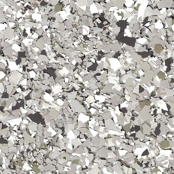 The image shows a textured surface resembling scattered gray and white flakes, creating an abstract pattern without discernible landmarks or people.