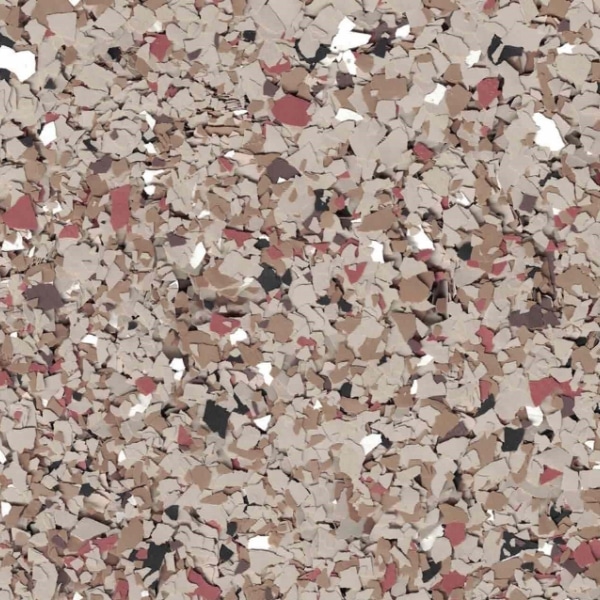 A textured surface with a mix of beige, brown, and red chips, providing a speckled, abstract appearance commonly seen in flooring designs.