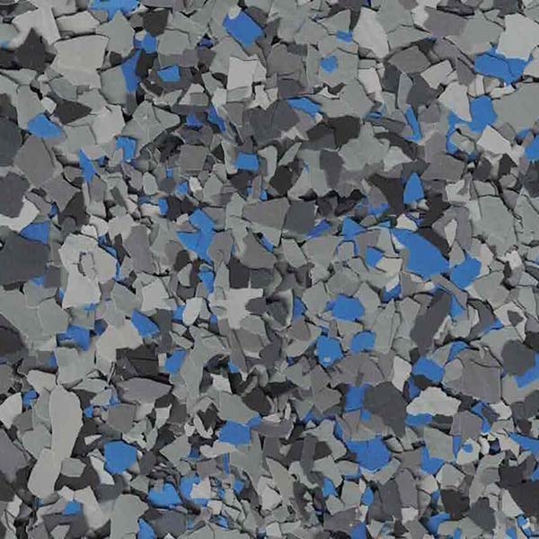 Multicolored fragmented pattern with shades of blue, gray, and black, resembling chipped paint or abstract, textured surface without recognizable landmarks or buildings.